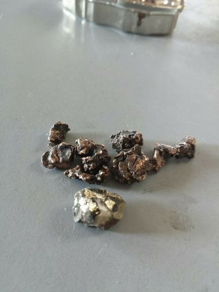 GOLD NUGGETS 9,  grams and small metal box.  Low purity. 7