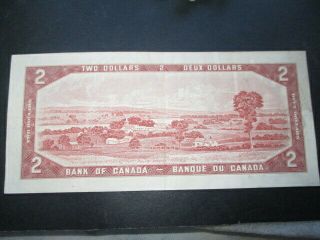 H - 1954 BANK OF CANADA CANADIAN $2.  00 BILL TWO DOLLAR CIRCULATED ORANGE 2