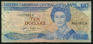 East Caribbean States 10$ 1985 - 1993 Qe Ii & Surfer - P23a - Signature 1 - F/vg