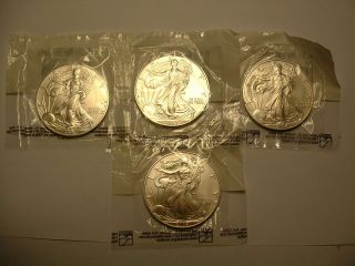 4 - - 2004,  2001,  American Silver 1 Oz.  999 Eagles In Littleton Cellophane