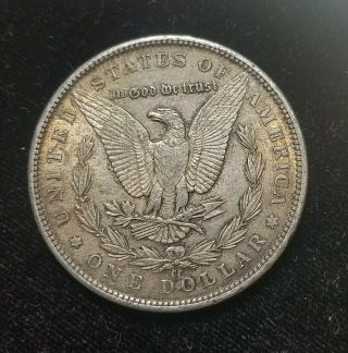 1890 - CC Carson City Silver Morgan Dollar toned AU.  Latent lustre 2