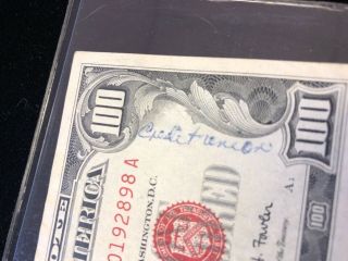 Series 1966 A $100 United States Red Seal Note au writing on face 4
