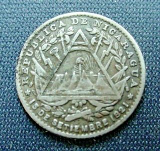 . 800 Silver 1887 H Nicaragua 5 Centavos Flagged Triangular Arms Grade