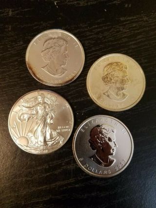 Silver Bullion 1 Oz Coins 2011 Maple Leafs,  Eagle (4 Coins)