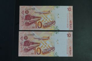 Malaysia $10 note in gem - UNC prefix GQ prefix x 2 notes (v389) 2