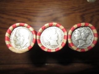 Unsearched Wheat Pennies With A Silver Dime On The End Of The Roll