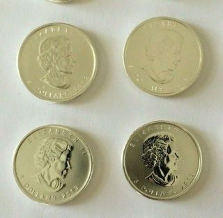 Four 1 Oz Canadian Maple Leaf Coins Random Dates 999 Pure Silver