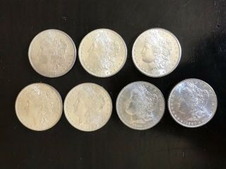 7 Morgan Silver Dollars 1878s,  1880s,  1881s,  1883o,  1884o,  1885,  O,  & 1886 All Bu
