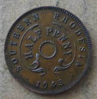 Southern Rhodesia 1/2 Penny 1942 Error Coin No Hole.  Jo - 7903