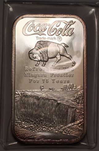 1 Oz Silver.  999 Fine Coca Cola 75th Anniversary Buffalo Ny Bottling Company
