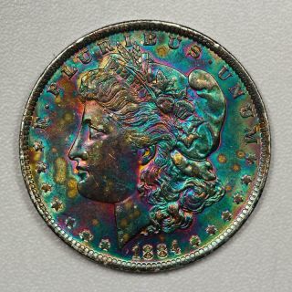 1884 - O Morgan Silver Dollar BU Vibrant Rainbow Toning 2