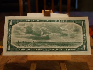 1954 $1 CANADIAN NOTE,  CH/CU,  VIGNETTE ON BACK,  NOTE 2