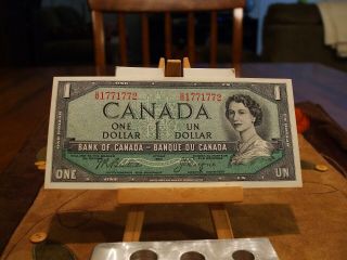 1954 $1 CANADIAN NOTE,  CH/CU,  VIGNETTE ON BACK,  NOTE 3