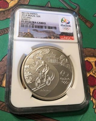 2014 Brazil Rio Olympics Cycling Silver 5 Reais Coin (ngc Proof 69 Ultra Cameo)