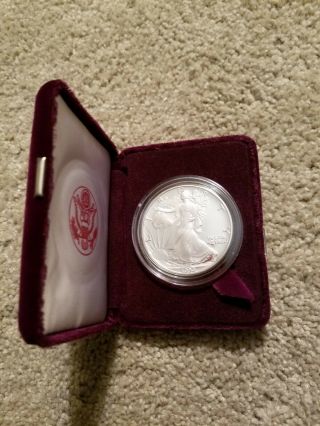 1990 American Eagle One Ounce Proof Silver Bullion Coin and 4