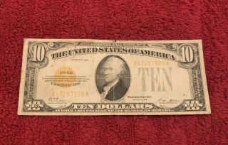 1928 10 Dollar Gold Certificate,  2 Small Tears One 1/2” Tear,  Note