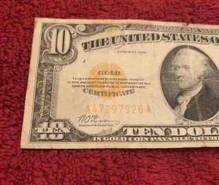 1928 10 Dollar Gold Certificate,  2 Small Tears One 1/2” Tear,  Note 3