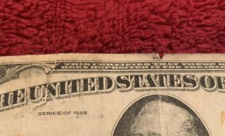 1928 10 Dollar Gold Certificate,  2 Small Tears One 1/2” Tear,  Note 4