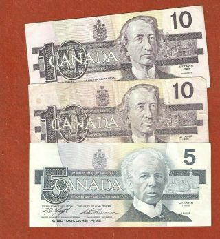 2 Ten & 1 Five Dollar Bank Notes They Are Well Circulated 25.  00 Face Value