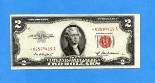 1953 A $2 United States Star Note,  Red Seal,  Au,  (1875)
