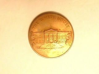 Bronze Medal Showing The White House And The Great Seal Of The United States