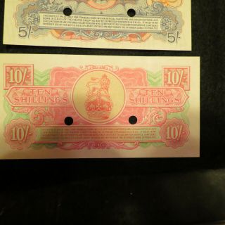 Set of 4 canceled bank notes by British soldiers in World War 2.  Very Rare. 2
