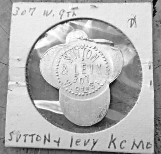 Sutton & Levy 307 W.  9th St Kansas City Mo Good For 21/2 Cents In Trade Token