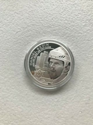 2017 Upper Deck Grandeur Coins Daniel Sedin High Relief Silver Troy Ounce /1000