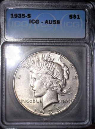 1935 - S Peace Silver Dollar,  Icg Au58,  Bright White,  Under Grade,  Tough Date.