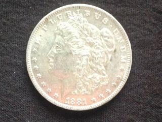 1881 - O Morgan Silver Dollar.  A Bu Coin.  Bidding Starts 99 Cents.
