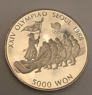 South Korea Seoul Olympics Tug Of War 1986 5,  000 Won Proof Silver Crown