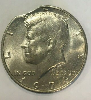 1974 Kennedy Half Dollar Curved Clipped Planchet Error