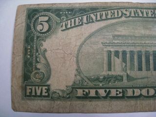 1934 - A $10 Gold Seal North Africa Silver Certificate K55612737A.  5 4