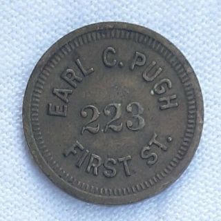 Peoria,  Illinois.  Earl C.  Pugh,  223 First St. ,  Good For 5 Cent 