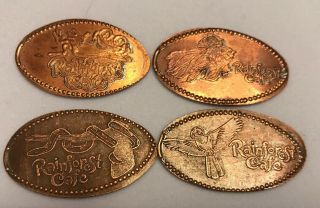 Set Of (4) Rainforest Cafe Downtown Disney Pressed Elongated Pennies Retired