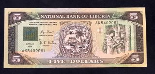Liberia 5$ 1991.  04.  06.  Man Tapping Rubber & Latent Image Of Star - P20 - Unc