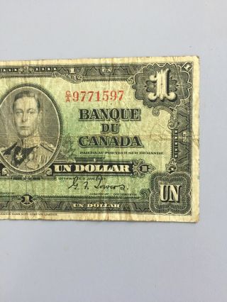 1937 - Canadian One dollar bill Circulated $1 CA 9771597 2
