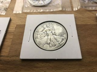 7 Liberty Walking Silver Dollars 1942F,  1935 - S VG,  1936 - S 1936 - D VG,  32,  42&43 8