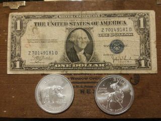 Silver,  2 Troy Oz.  999 Fine,  Bull/bear With A $1 Silver Certificate.