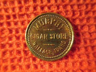 Wallace,  Idaho Brass Cigar Store Trade Token