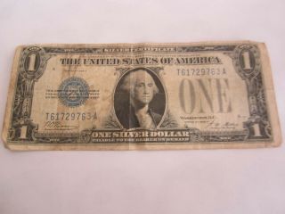 1928 - A $1 Silver Certificate,  Funny Back Note,  Large Blue Seal