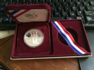 1984 - S Proof Los Angeles Olympic Coliseum Silver Dollar Coin