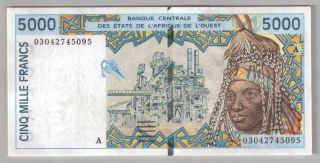 561 - 0077 West African States A - Ivory Coast,  5000 Francs 2003,  Pick 113am,  Unc