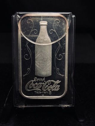 1976 Coca Cola 75th Anniversary 1 oz Silver Art Bar Chicago SN 1796 (1793) 2