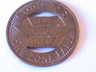TRANSIT TOKEN RED ARROW LINES P.  S.  T.  Co.  GOOD FOR ONE ZONE FARE BRASS 4