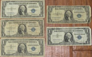 5 One Dollar $1 U.  S.  Silver Certificates 1935 - E,  1935 - F,  1935 - G,  1957 - B (2)