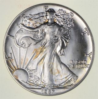 Better Date 1987 American Silver Eagle 1 Troy Oz.  999 Fine Silver 210
