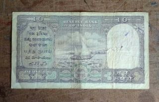 India 1957 Ten rupee bank note prefix X plain inset Signed H.  V.  R.  Iyengar 2