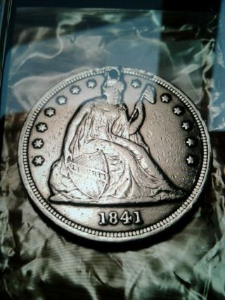 1841 Silver Seated Liberty One Dollar Coin