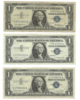 (3) 1957 $1 United States Silver Certificate Bills Blue Seal 1957,  1957a,  1957b